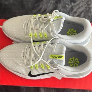 Nike Men's White and Neon Yellow Athletic Shoes with Black Swoosh